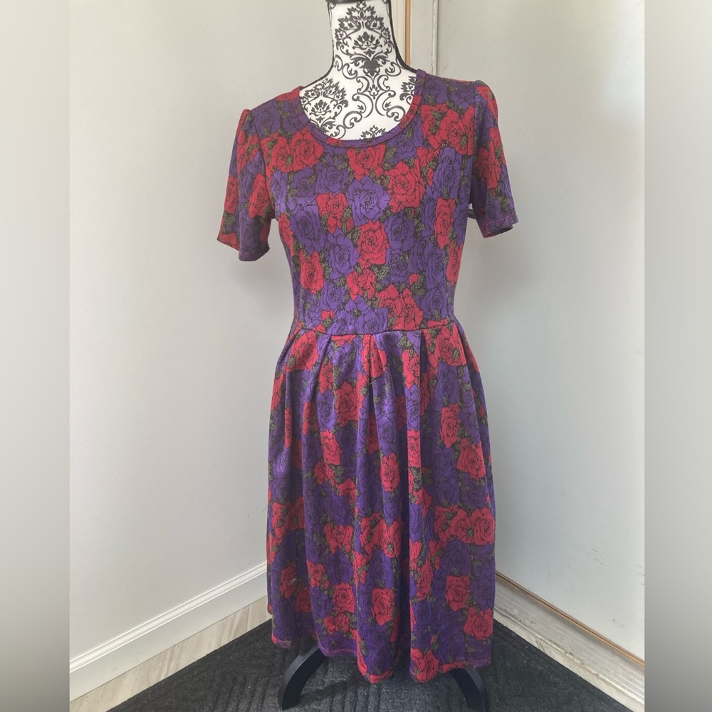 LulaRoe Amelia, size L, 97% polyester, 3% spandex .  Red, purple green, & black.